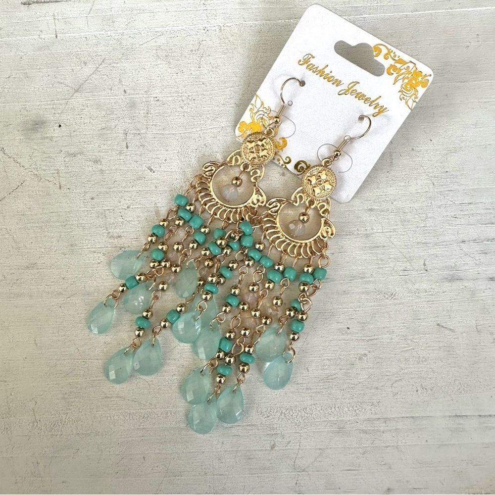 Gold tone and blue chandelier earrings